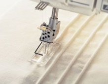 Лапка для вшивания шнура и защипов для машинок Husqvarna Лапка для вшивания шнура и защипов для машинок Husqvarna